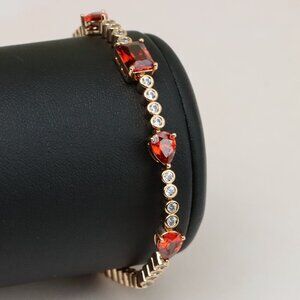 "Rose Gold Bracelet with Red Gem Accents and Round White Stones, XPBL0845